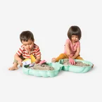 Clamshell sandbox with sand moulds